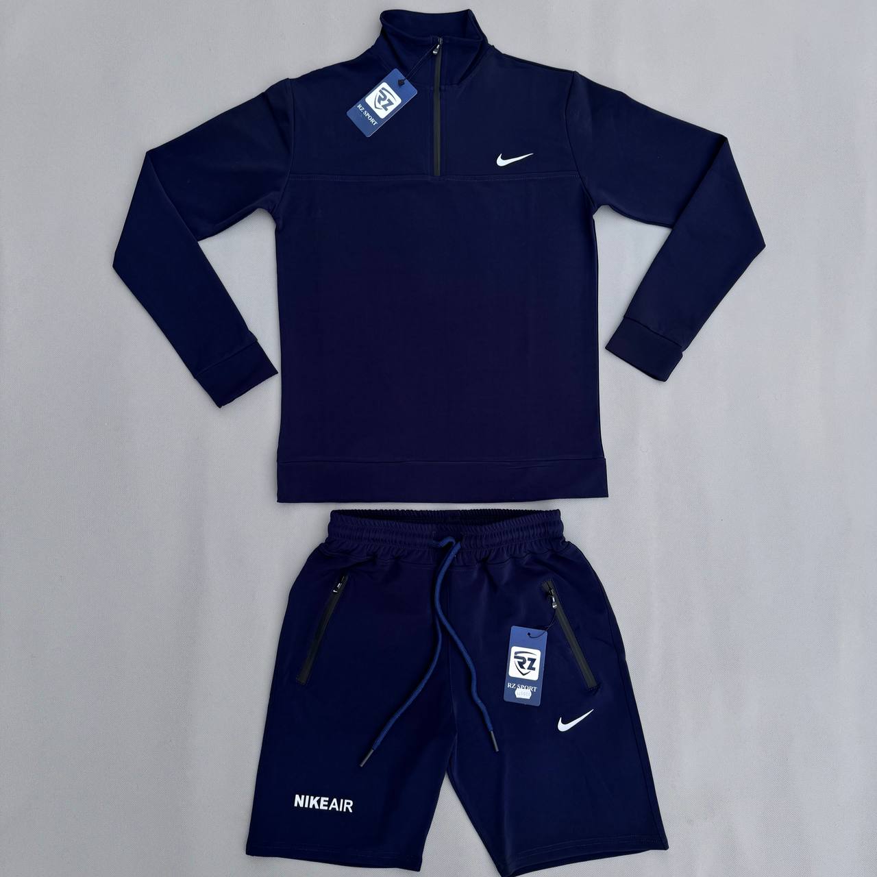 photo_2025-01-28_05-00-34 (1) ست سویشرت شلوارک نایک سرمه ای - Nike - تصویر 1